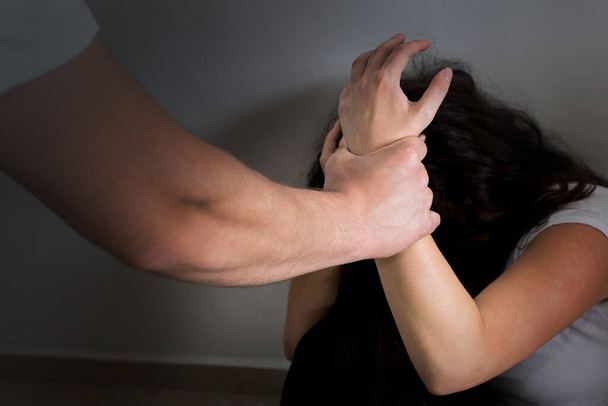 A male hitting on a female, the concept of domestic violence against women - Valokuva, kuva