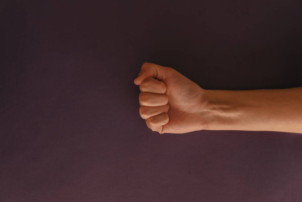 A closeup shot of clenched fist - concept of solidarity and support - Fotó, kép