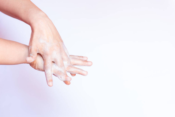 A closeup isolated shot of soapy washing hands - Φωτογραφία, εικόνα