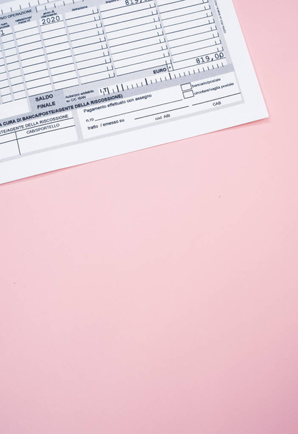 A form paper on a pink background - Foto, Imagen