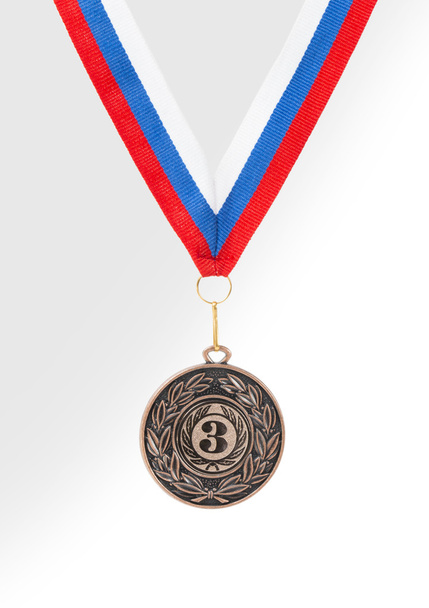 Medaille auf weißem Hintergrund - Foto, Bild