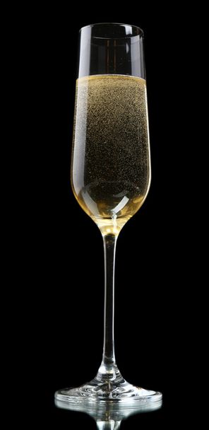 Glass of champagne, on black background - Фото, зображення