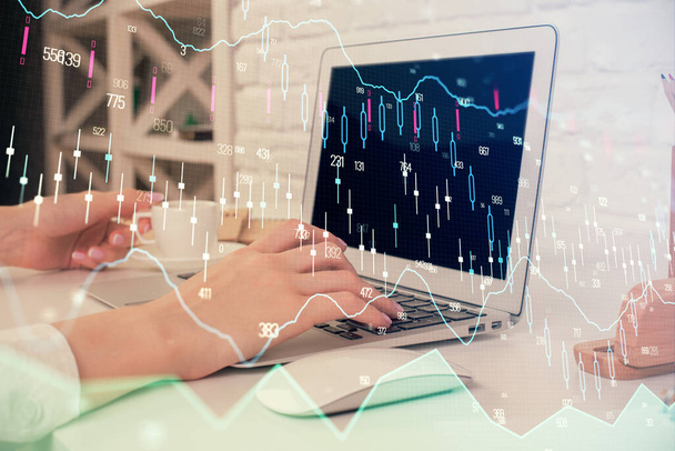 Double exposure of woman hands typing on computer and forex chart hologram drawing. Stock market analysis concept. - Photo, image