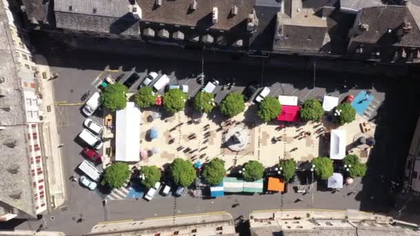Aerial vertical view over place Henri Cordesse with trees and people France - Footage, Video