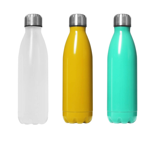 Set of modern thermos bottles in different colors on white background  - Foto, immagini