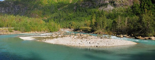 Panorama Of The Beautiful Wild River Jostedola In Jostedalsbreen National Park On A Sunny Summer Day With A Clear Blue Sky And A Few Clouds - Foto, Imagen