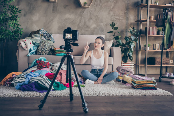 Portrait of her she nice attractive girl housekeeper sitting on floor giving workshop chores household recording online internet video in modern loft industrial interior apartment flat - Foto, Imagen
