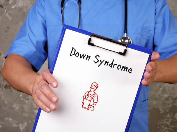 Orvosi fogalom a Down-szindrómáról, kifejezéssel a papíron - Fotó, kép