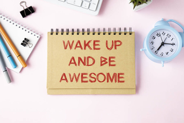 wake up and be awesome advice or reminder - handwriting on napkin with a cup of coffee - Photo, Image