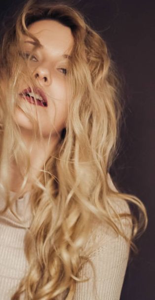 Beauty portrait of young woman, long blonde hairstyle and natural makeup look, cosmetics and 90s style fashion campaign - 写真・画像