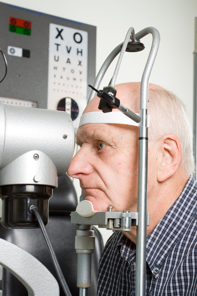 Older man having eye examination - Photo, Image