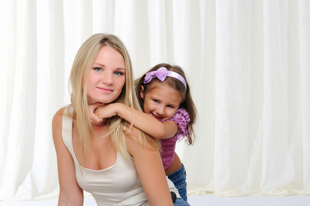 Young mother and her young daughter - Foto, Bild