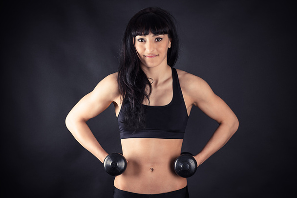 Sports cute girl with dumbbells - Photo, Image