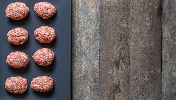 meatballs on plate on wooden table - Photo, image