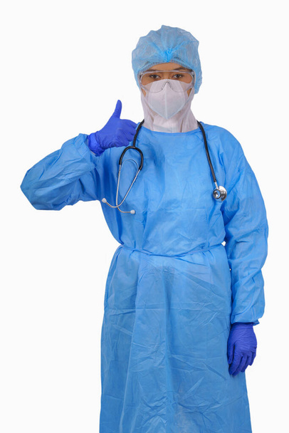 portrait of female nurse or doctor in coverall PPE uniform to protect coronavirus covid-19 isolated on white background with clipping path - Valokuva, kuva