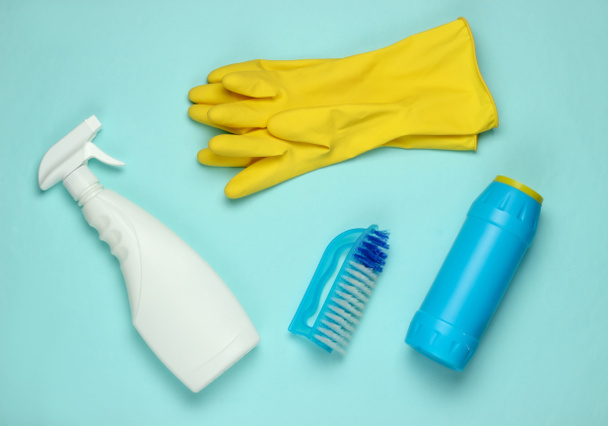 Set of products for cleaning the house on blue background. Top view. - Photo, Image