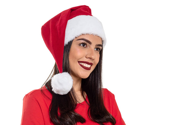 Woman with Christmas hat isolated on white background. - Foto, Bild
