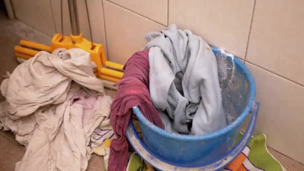 Throw Dirty Things, Rags into Bucket in Bathroom. Scattered Rags. Cleaning - Footage, Video