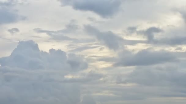 Time lapse sunset and beautiful twilight fluffy storm cloudy blue and yellow sky smoothly flowing to fantastic mind. Rainny good evening and have a nice day concept - Footage, Video