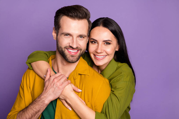Close-up portrait of his he her she nice attractive lovely lovable careful cheerful cheery glad couple embracing dating care isolated on bright vivid shine vibrant lilac violet purple color background - Foto, Imagem