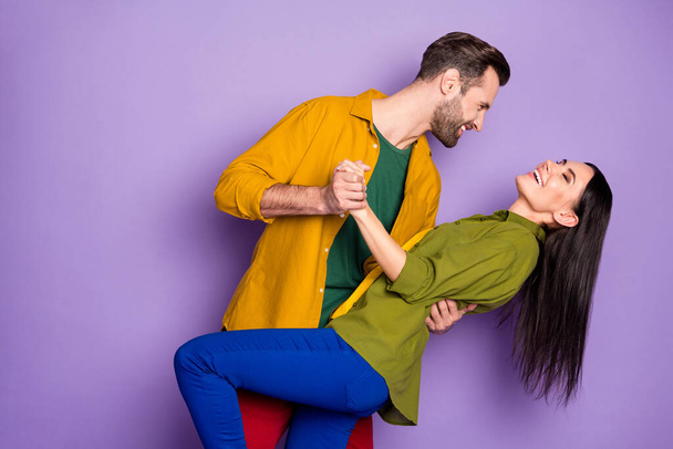 Profile photo pretty lady handsome guy couple hugging holding hands slow dancing good mood quarantine time wear casual shirts clothes isolated purple color background - Zdjęcie, obraz