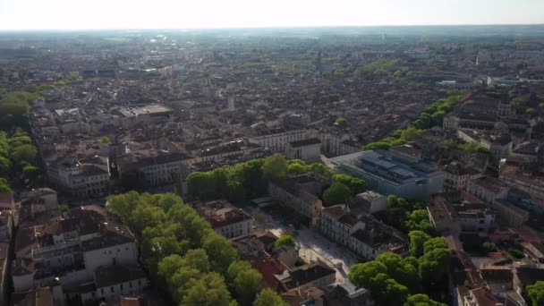 Assas square Maison carre Nimes city center aerial view during spring morning sunny day green trees - Footage, Video