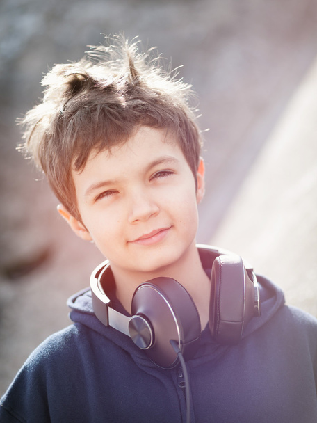 Young boy with headphones in vintage look - Photo, Image