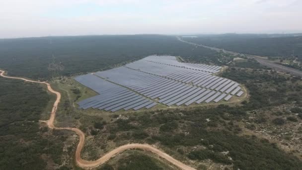 Aerial flight towards a solar park in France cloudy day - Footage, Video