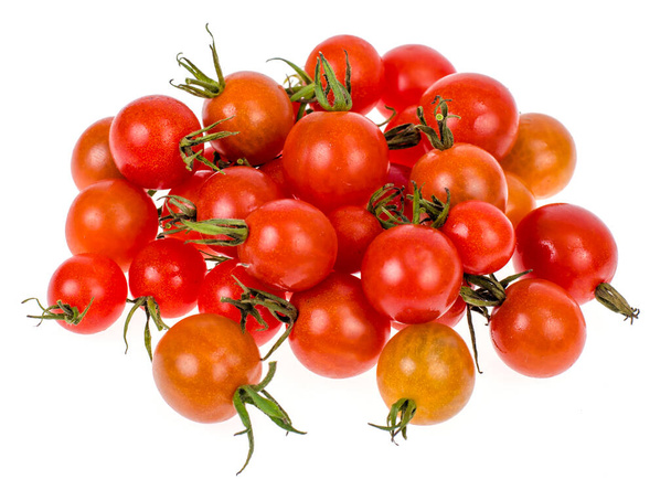 Miniatur-rote Kirschtomaten auf weißem Hintergrund, vegetarische und pflanzliche Produkte. Studio Phot - Foto, Bild