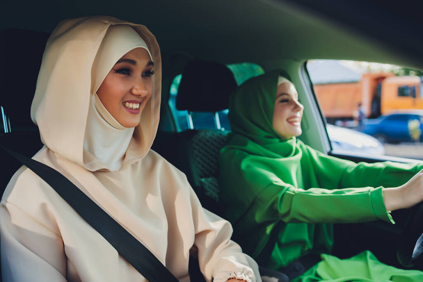 Arabic young Woman Couple Traveling By Car. - Foto, Imagen