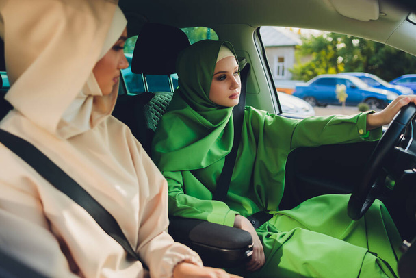 Arabic young Woman Couple Traveling By Car. - Zdjęcie, obraz