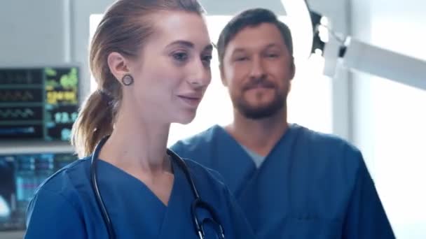 Professional medical doctors working in emergency medicine. Portrait of the surgeon and the nurse. - Кадри, відео