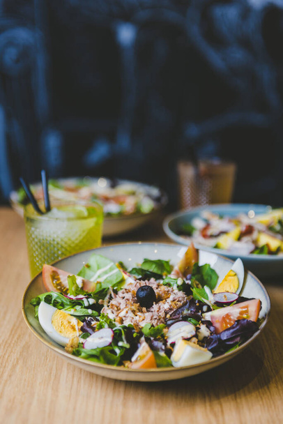 A vertical closeup shot of Spanish salad - Zdjęcie, obraz
