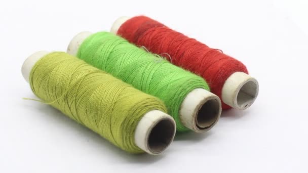 Thread rolls isolated on white background - Footage, Video