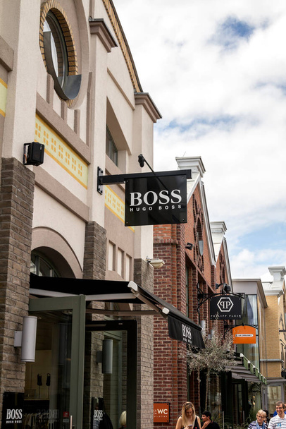 Ingolstadt, GERMANY : Hugo Boss store. Hugo Boss based in Metzingen in Germany it has 12,000 staff, 840 own stores and 2012 sales of EUR 2.3 billion in 129 countries - Photo, image