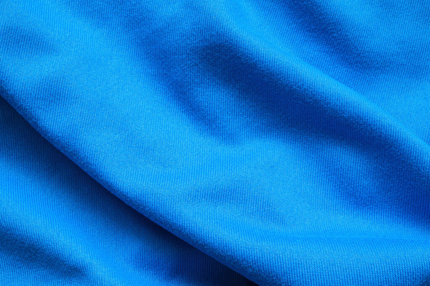 Mavi futbol forması kumaş kumaş kumaş spor giyim arka planı - Fotoğraf, Görsel