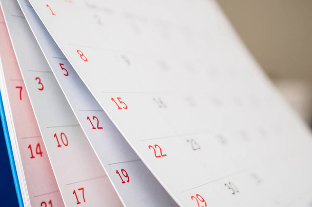 Calendar page flipping sheet close up on office table background business schedule planning appointment meeting concept - Photo, Image