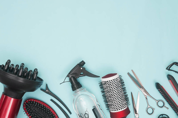 professional items for hairdressing, haircuts on a blue background, layout - Photo, Image