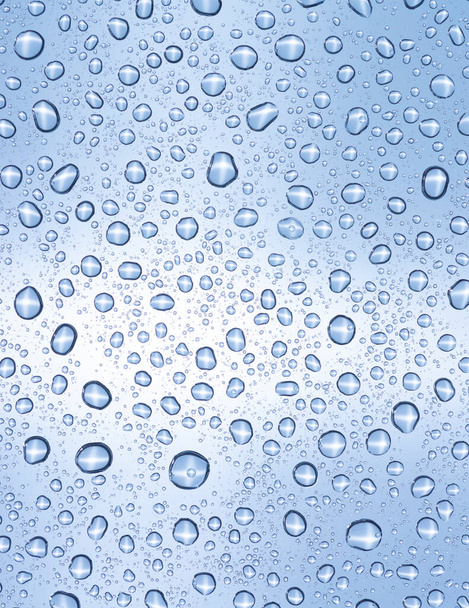 Water drops over light blue surface. - Photo, Image