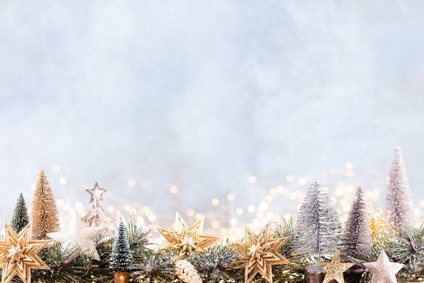 Christmas background with tree and blurred shiny lights. - Φωτογραφία, εικόνα