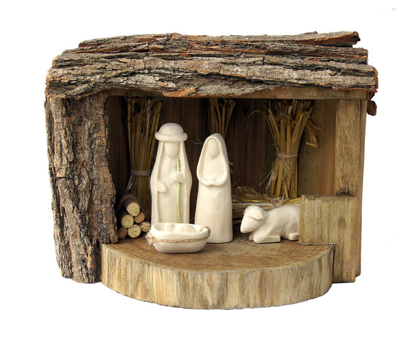 白い背景に隔離された彫刻の人物と素朴な木製のクリスマスのネイティブ - 写真・画像