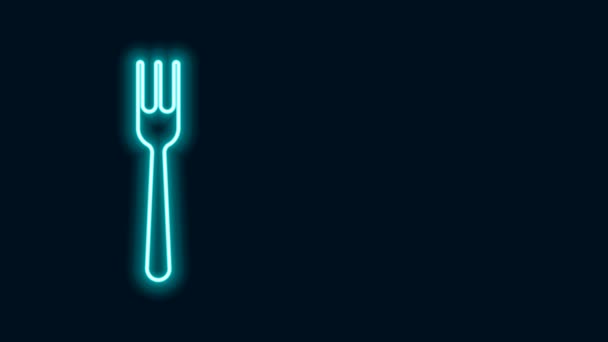 Gloeiende neon lijn Vork pictogram geïsoleerd op zwarte achtergrond. Bestek symbool. 4K Video motion grafische animatie - Video