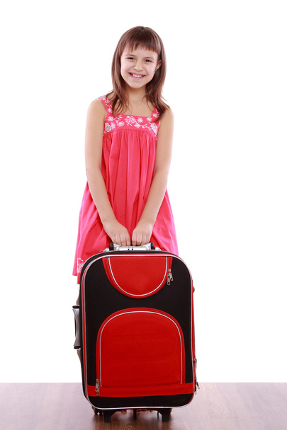 Little girl with suitcase - Фото, зображення