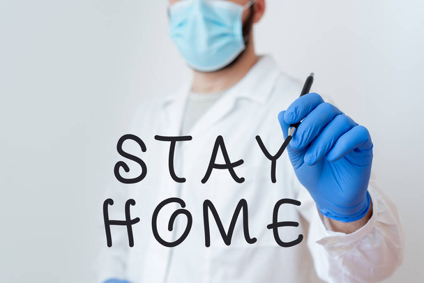 Conceptual hand writing showing Stay Home Save Lives. Business photo text lessen the number of infected patients by not leaving the house Laboratory Technician Featuring Sticker Paper Smartphone. - Photo, Image