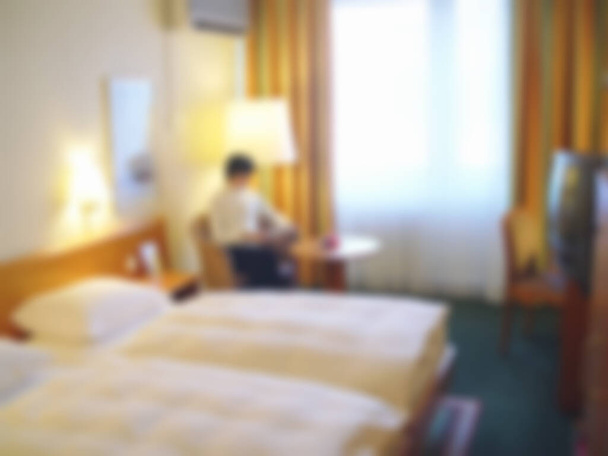 Abstraktní rozmazaný luxusní hotelový pokoj, rozostřený interiér ložnice na pozadí - Fotografie, Obrázek