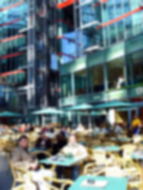 Defocused photography. Cozy street in Berlin, Germany. Blurred background copy space for your design - Photo, Image