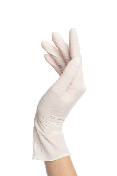Doctor wearing medical gloves on white background, closeup - Photo, image