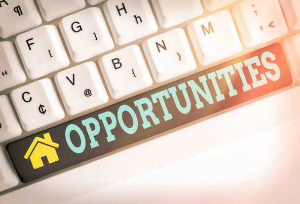 Text sign showing Opportunities. Conceptual photo good chance for advancement, favorable juncture circumstance Different colored keyboard key with accessories arranged on empty copy space. - Photo, Image