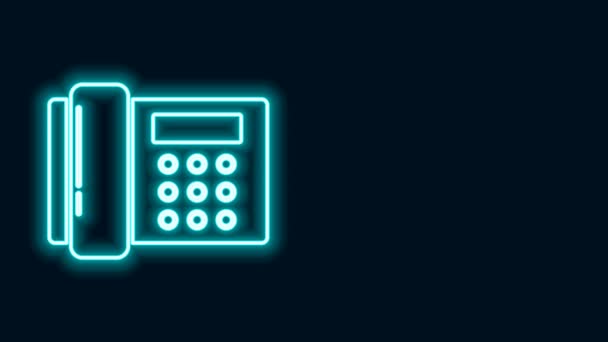 Glowing neon line Telephone icon isolated on black background. Landline phone. 4K Video motion graphic animation - Footage, Video