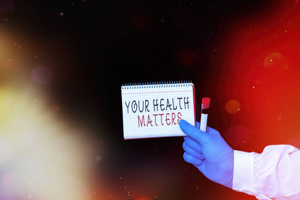 Käsitteellinen käsin kirjoittaminen osoittaa Your Health Matters. Business valokuva esittelee hyvää terveyttä on tärkeintä muun muassa Näytetään tarra paperi tarvikkeet Medical käsineet. - Valokuva, kuva